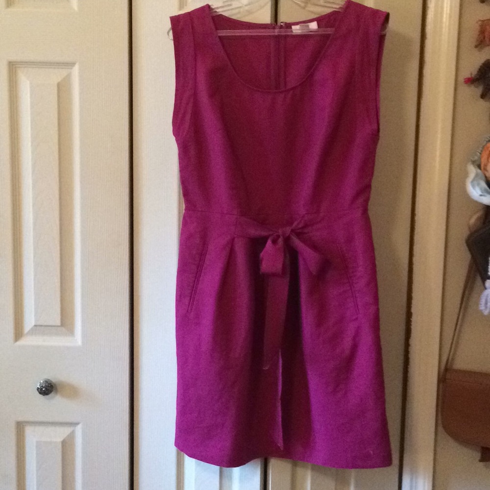 Flattering fuchsia dress with pretty bow detail!